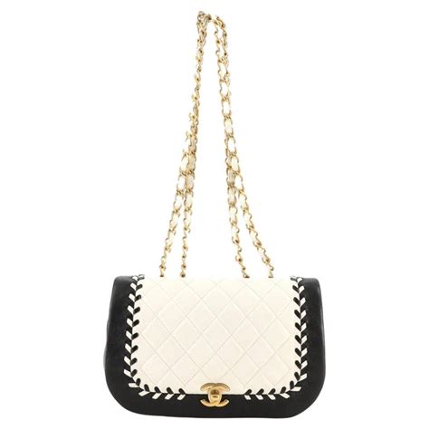 chanel bicolor braided saddle flap|fashionphile Chanel flap.